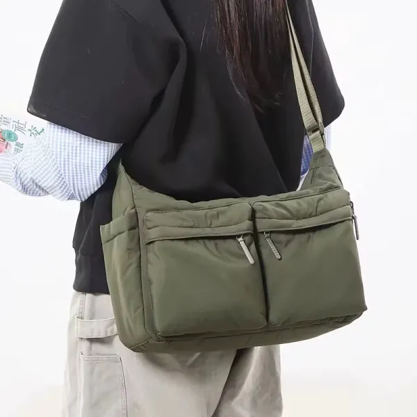 Beige_Diaper_Bag_with_Multiple_Pockets_and_Adjustable_Shoulder_Strap