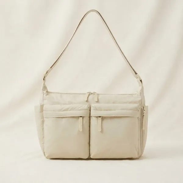 Beige_Diaper_Bag_with_Multiple_Pockets_and_Adjustable_Shoulder_Strap