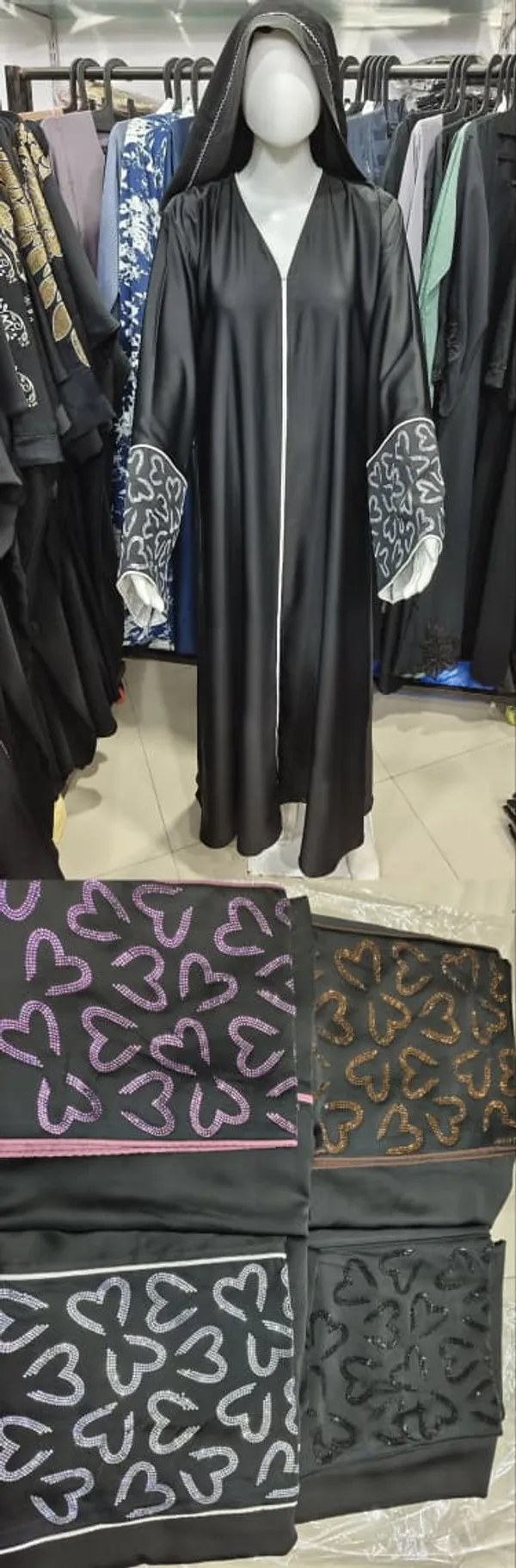 Black_Abaya_With_Embroidered_Pockets_And_Silver_Trim