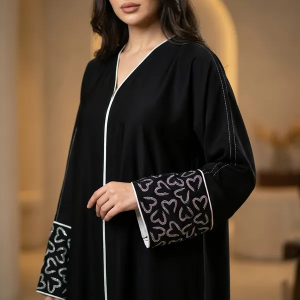Black_Abaya_With_Embroidered_Pockets_And_Silver_Trim