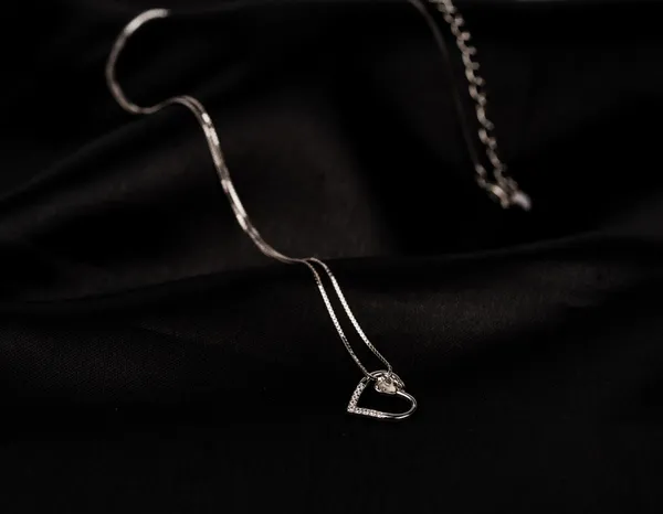 Heart_Holding_Heart_Neck_Chain_|_Sterling_Silver