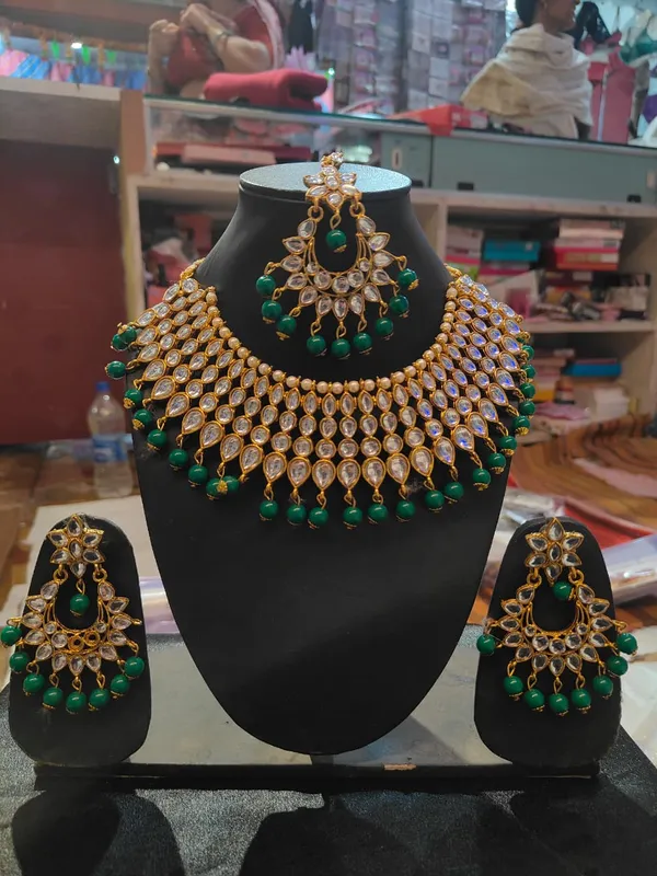 Green_Kundan_Polki_Necklace_Set_With_Earrings_And_Maang_Tikka_For_Women