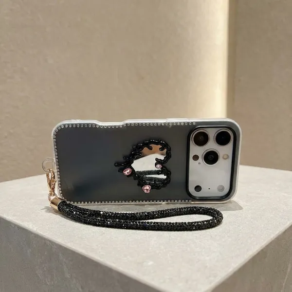 Dripping_Heart_Phone_Case_with_Rhinestone_Border_and_Wrist_Strap