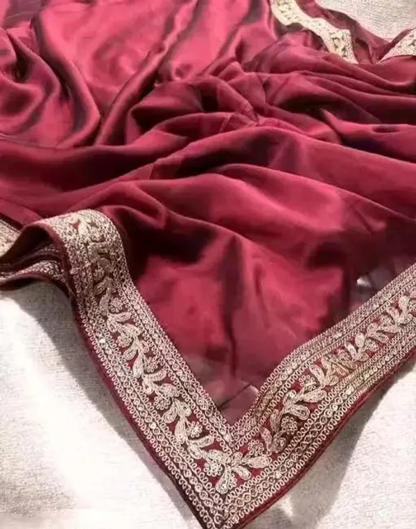 Maroon_Designer_Maroon_Georgette_Saree_With_Heavy_Embroidered_Border_And_Blouse_Piece