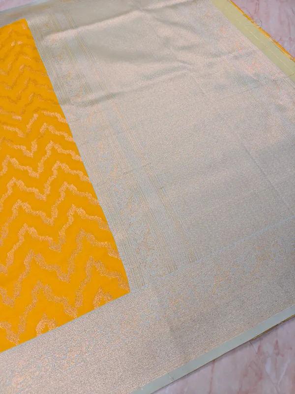 BANARASI_KATAN_SILK_IN_AIRY_GOLD_WITH_LIGHT_BLUE_BORDER