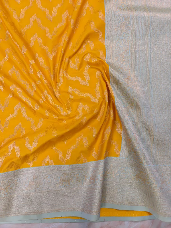 BANARASI_KATAN_SILK_IN_AIRY_GOLD_WITH_LIGHT_BLUE_BORDER