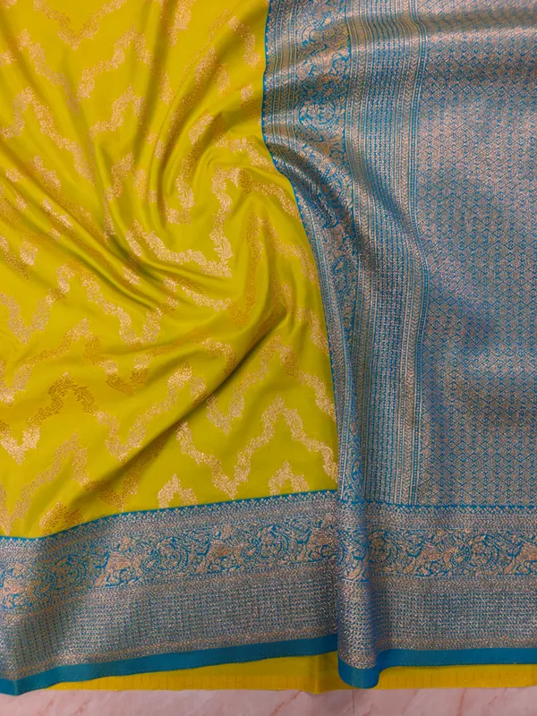 BANARASI_KATAN_SILK_IN_GOLD_WITH_SKY_BLUE_BORDER