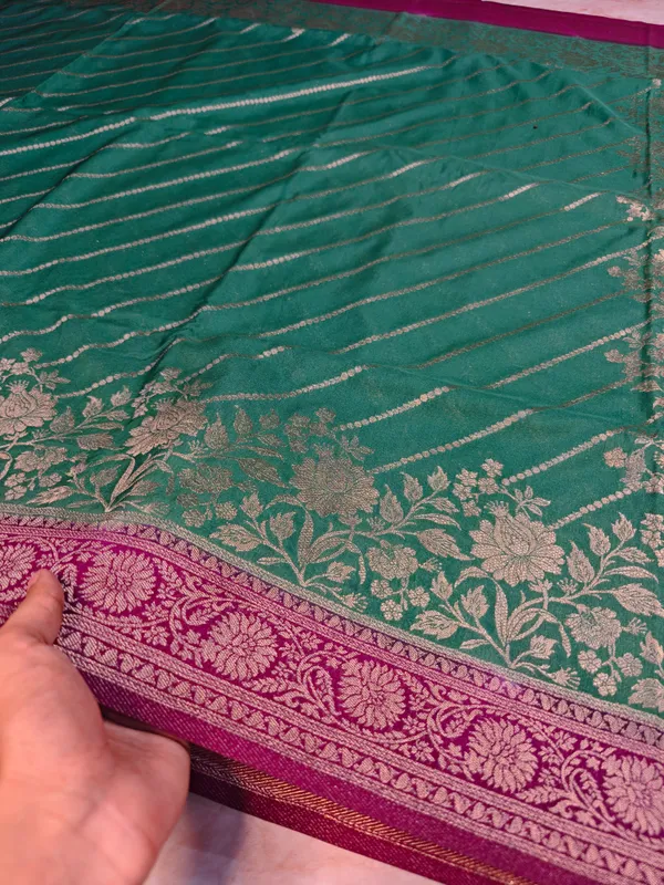 Khaddi_Georgette_In_Bottle_Green_With_Magenta_Border_Saree_For_Women