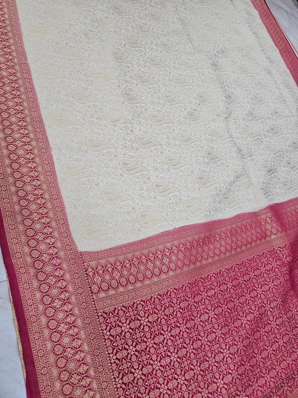 KHADDI_GEORGETTE_IN_CREAM_WITH_RED_BORDER