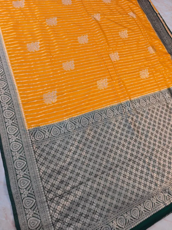 Khaddi_Georgette_In_Mustard_Gold_With_Bottle_Green_Saree_For_Women