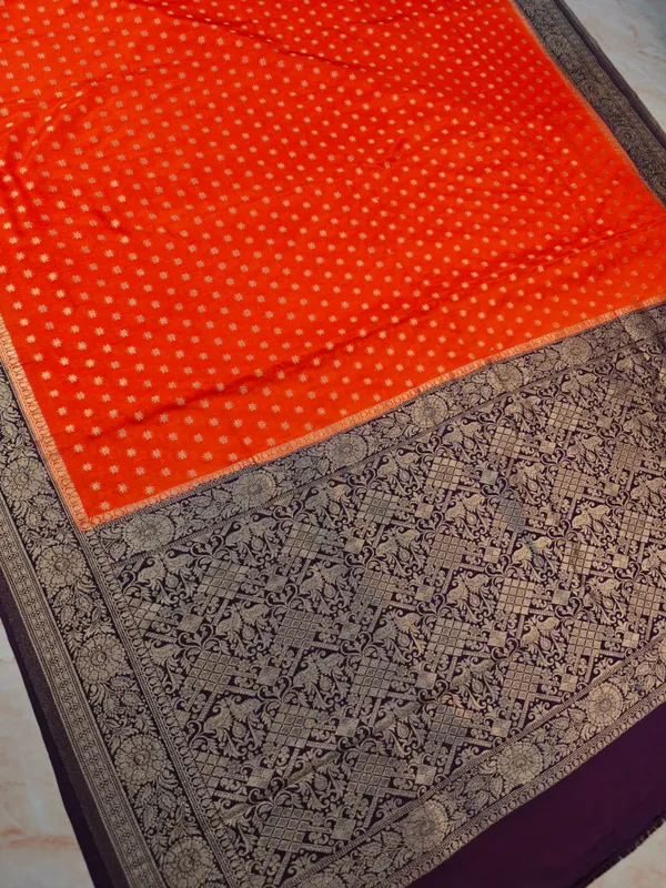 Khaddi_Georgette_In_Orange_With_Magenta_Border_Saree_For_Women