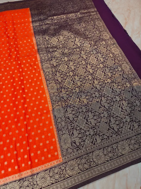 Khaddi_Georgette_In_Orange_With_Magenta_Border_Saree_For_Women