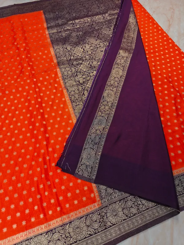 Khaddi_Georgette_In_Orange_With_Magenta_Border_Saree_For_Women
