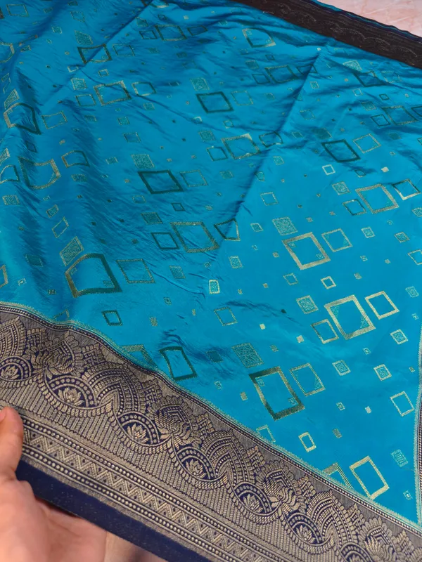 Russian_Silk_Viscose_In_Turquoise_Blue_With_Navy_Blue_Border_Saree_For_Women
