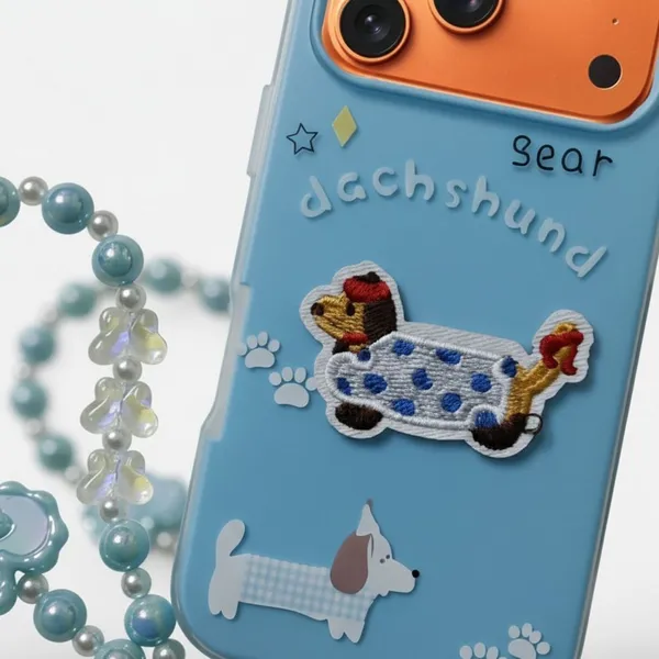 Cute_Dachshund_Puppy_With_Beaded_Wrist_Strap_Case_Cover_for_iPhone_17_Pro