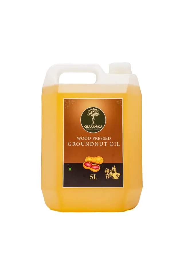 Wood_Pressed_Groundnut_Oil_Cold_Extracted_Peanut_Oil_For_Cooking_Traditional_Wood_Press_Method_Edible_Oil_For_Kitchen_Use_Suitable_For_Daily_Cooking_Needs_5_L