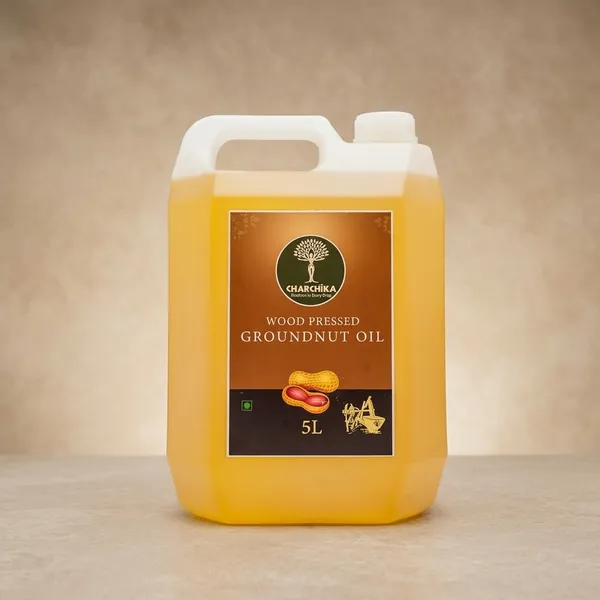Wood_Pressed_Groundnut_Oil_Cold_Extracted_Peanut_Oil_For_Cooking_Traditional_Wood_Press_Method_Edible_Oil_For_Kitchen_Use_Suitable_For_Daily_Cooking_Needs_5_L