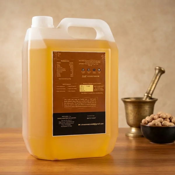 Wood_Pressed_Groundnut_Oil_Cold_Extracted_Peanut_Oil_For_Cooking_Traditional_Wood_Press_Method_Edible_Oil_For_Kitchen_Use_Suitable_For_Daily_Cooking_Needs_5_L