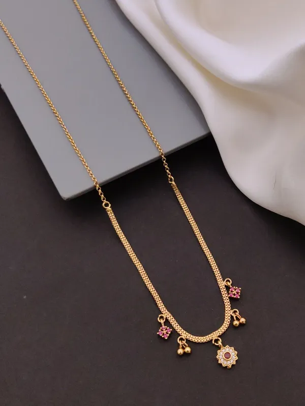 Gold-Toned_Floral_Charm_Necklace_With_Pink_Stones