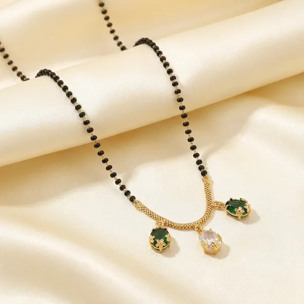 Elegant_Black_Bead_Mangalsutra_With_Green_And_Pink_Crystal_Pendants