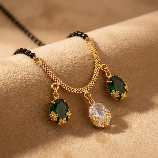 Elegant_Black_Bead_Mangalsutra_With_Green_And_Pink_Crystal_Pendants