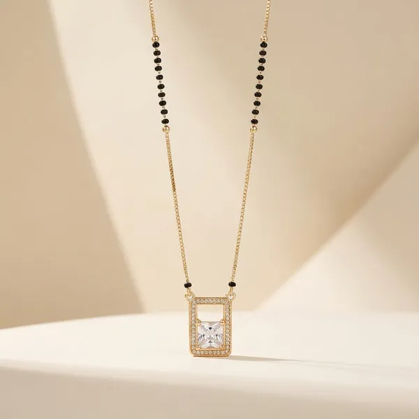 Elegant_Gold-Tone_Rectangle_Crystal_Pendant_Necklace_With_Black_Beaded_Chain_And_Mangalsutra_And_Crystal_Wing_Pendant_(Pack_Of_2)