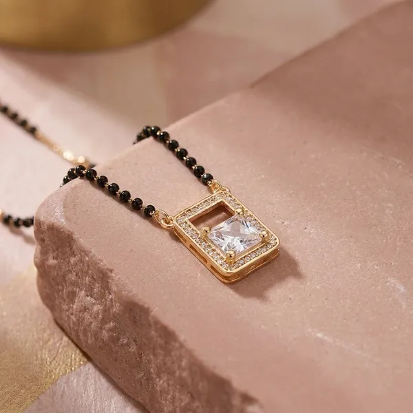 Elegant_Gold-Tone_Rectangle_Crystal_Pendant_Necklace_With_Black_Beaded_Chain_And_Mangalsutra_And_Crystal_Wing_Pendant_(Pack_Of_2)