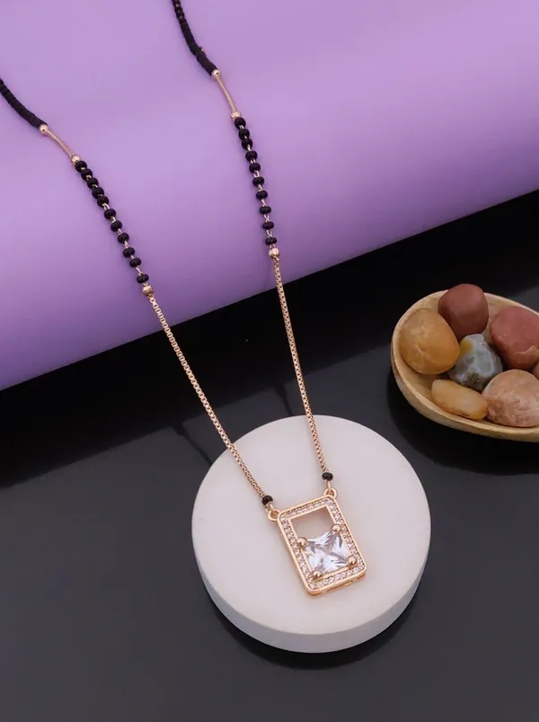 Elegant_Gold-Tone_Rectangle_Crystal_Pendant_Necklace_With_Black_Beaded_Chain_And_Mangalsutra_And_Crystal_Wing_Pendant_(Pack_Of_2)