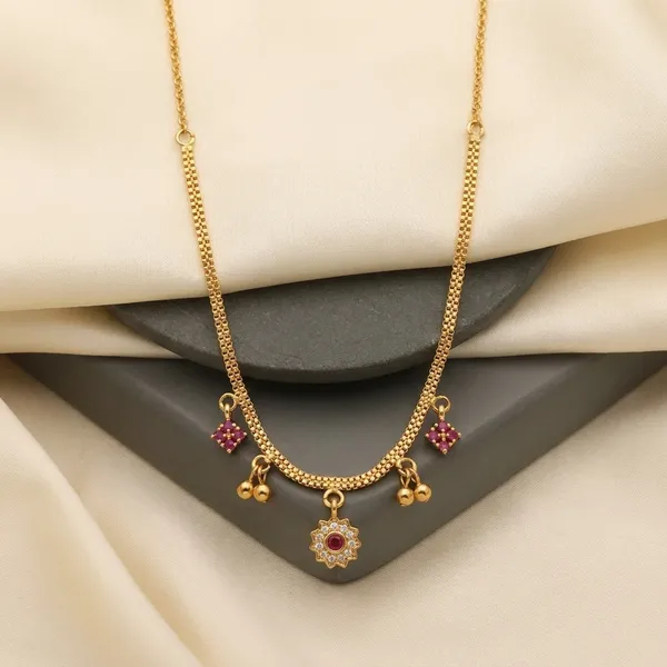 Gold-Toned_Floral_Charm_Necklace_With_Pink_Stones