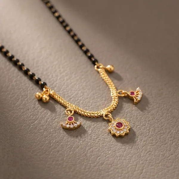 Traditional_Black_Beaded_Mangalsutra_With_Golden_Pendant_Charms