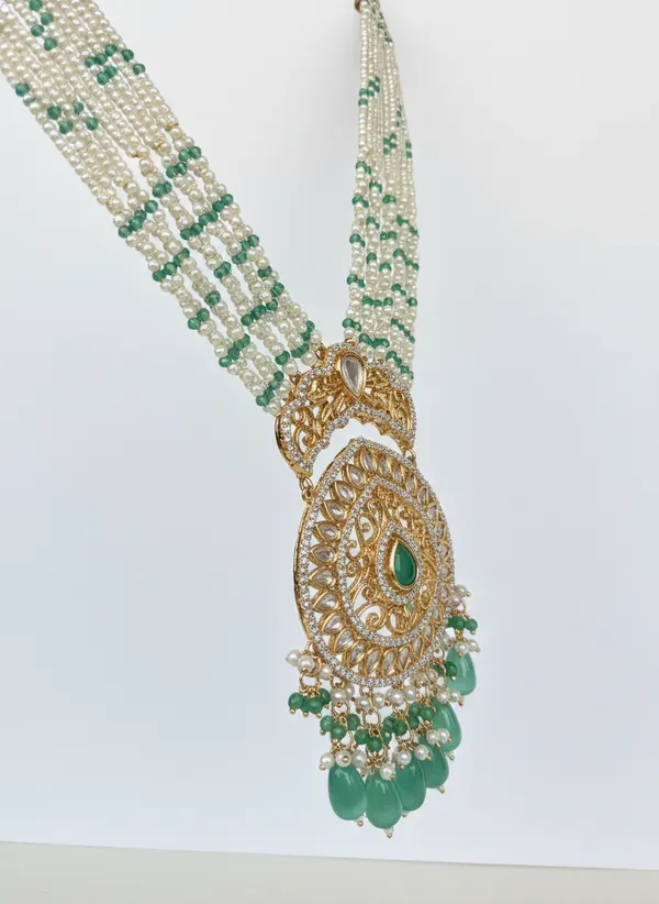 Regal_Multi_Strand_Pearl_And_Emerald_Kundan_Pendant_Set