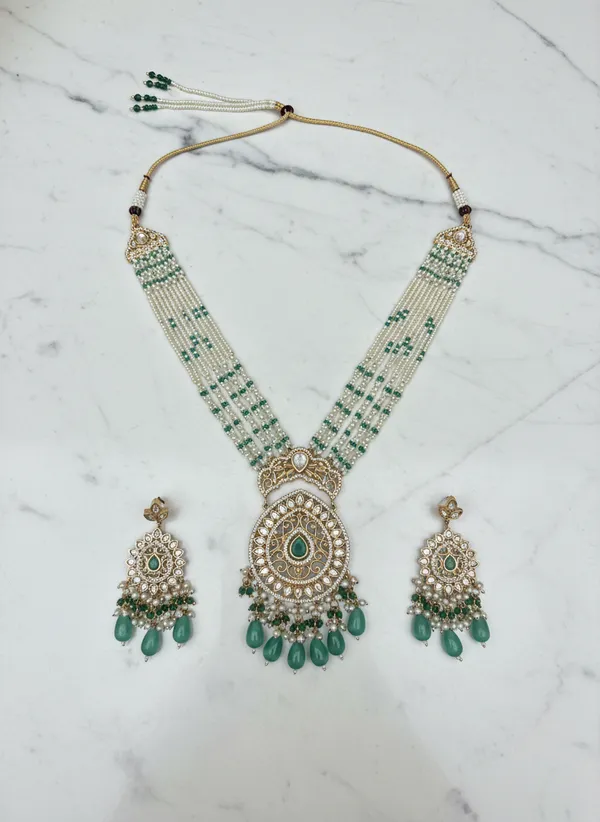 Regal_Multi_Strand_Pearl_And_Emerald_Kundan_Pendant_Set