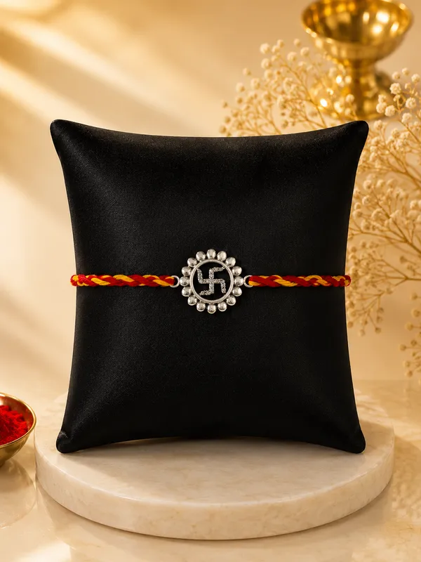 Divine_Swastika_Rakhi_(Sterling_Silver_925)_In_Sacred_Thread