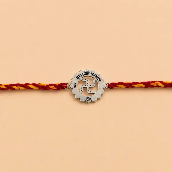 Divine_Swastika_Rakhi_(Sterling_Silver_925)_In_Sacred_Thread