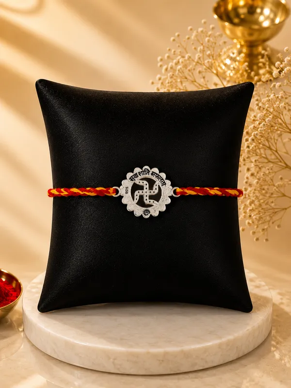 Divine_Swastika_Rakhi_(Sterling_Silver_925)_In_Sacred_Thread
