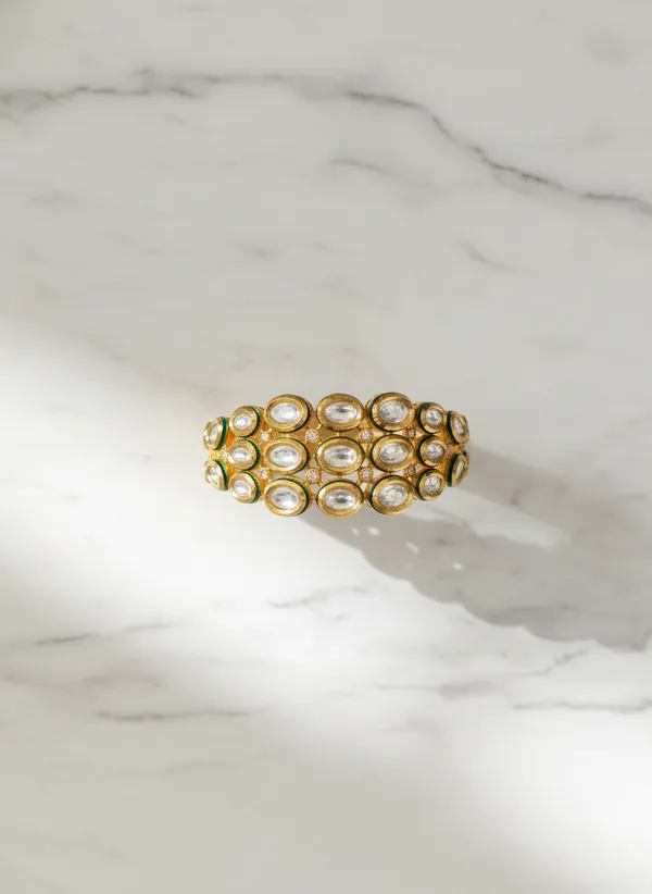 Gold_And_Clear_Toned_Exquisite_Kundan_And_Cz_Half-Top_Bracelet