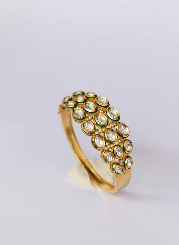Gold_And_Clear_Toned_Exquisite_Kundan_And_Cz_Half-Top_Bracelet