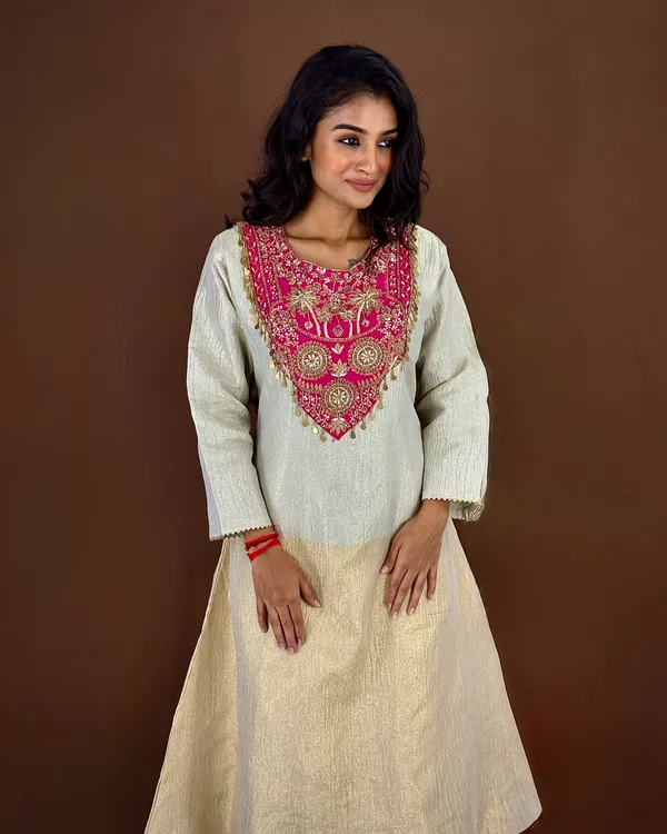 Offwhite_Embroidered_Kurta_Palazzo_Set_With_Pink_Embellished_Neckline