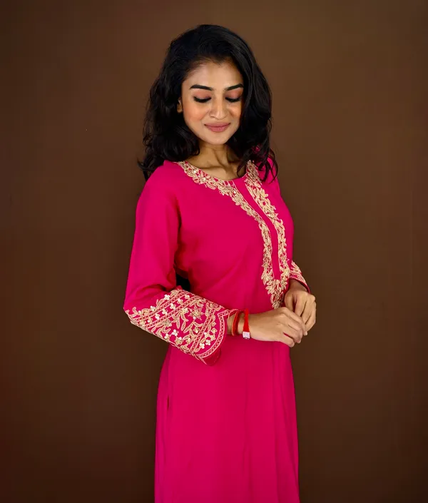 Elegant_Pink_Embroidered_Kurta_Set_With_Golden_Detailing