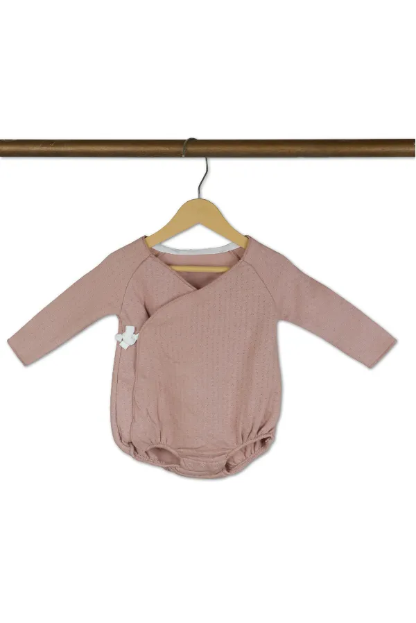 Pink_Baby_Onesie_With_White_Bow_Detail