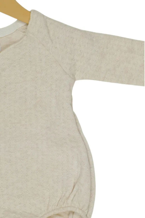 White_Baby_Onesie_With_Bow_Detail