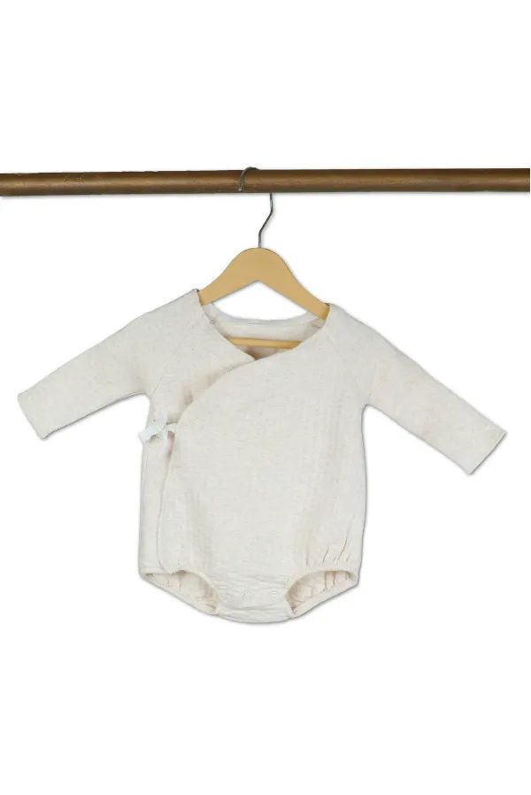 White_Baby_Onesie_With_Bow_Detail