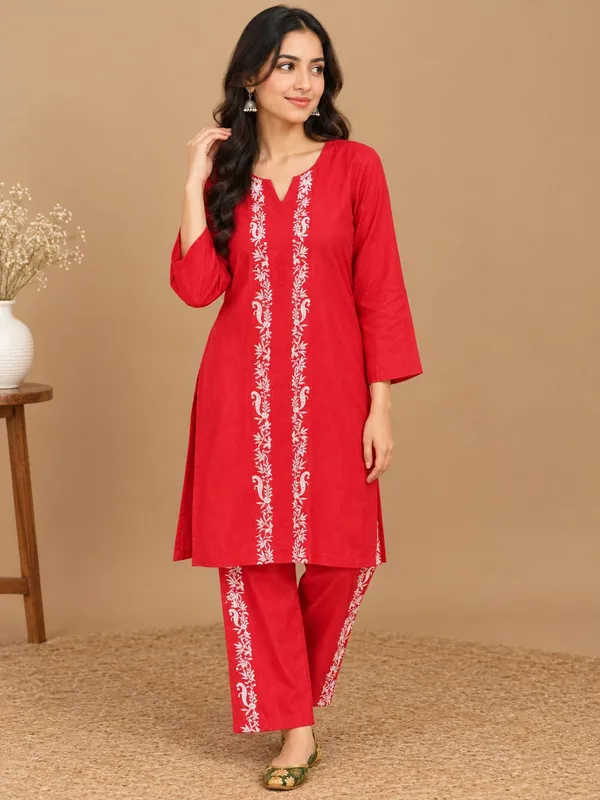 A_vibrant_red_ethnic_kurta_featuring_a_straight_silhouette,_V-slit_neckline,_