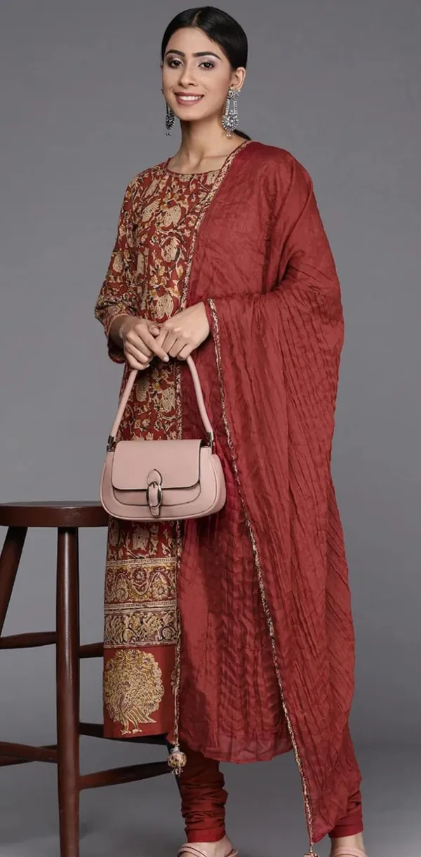 BIBA_Straight-cut_kurta_with_a_round_neckline_and_three-quarter_sleeves,_adorned_with_all-over_traditional_prints_for_a_rich_ethnic_look.