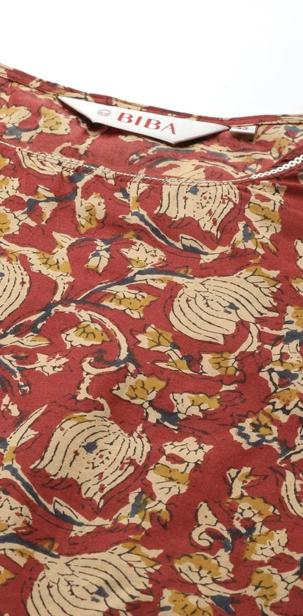 BIBA_Straight-cut_kurta_with_a_round_neckline_and_three-quarter_sleeves,_adorned_with_all-over_traditional_prints_for_a_rich_ethnic_look.