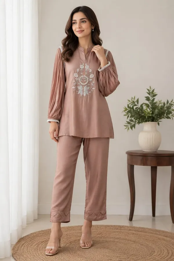 Beautiful_dusty_peach_two-piece_ethnic_set_featuring_a_sophisticated_kurta_with_delicate_embroidery.