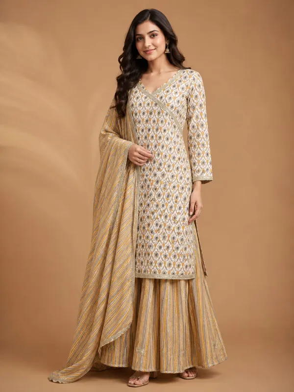 Beautiful_ethnic_three-piece_set_featuring_a_cream_kurtaflared_skirt_featuring_attractive_vertical