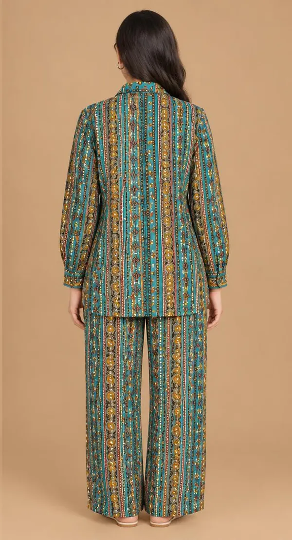 Beautiful_two-piece_co-ord_set_featuring_a_rich_teal_blue_base_with_an_attractive_traditional_ethnic_print.