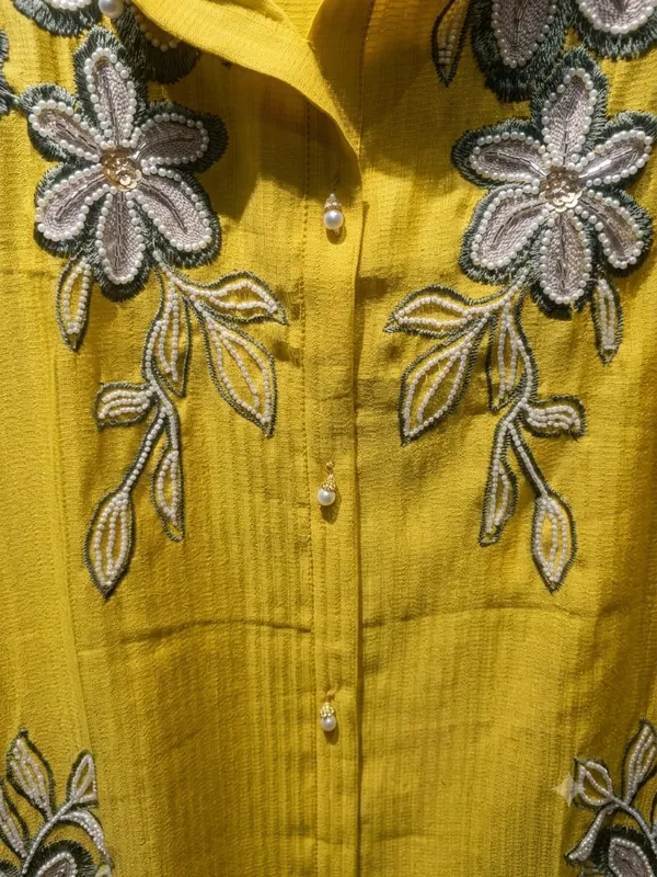 Embroidered_Cord_set_in_pure_with_beads_word_and_beauitful_designer_latkans_at_the_centre._pants_with_pocket_