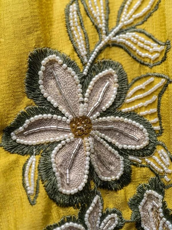 Embroidered_Cord_set_in_pure_with_beads_word_and_beauitful_designer_latkans_at_the_centre._pants_with_pocket_